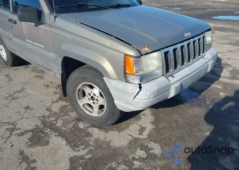 1997 Jeep Grand Cherokee Laredo/Tsi z USA, uszkodzony, nr VIN 1J4GZ58SXVC758449